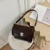 Bolso de axila versátil minimalista de nicho coreano para el día a día, bolso de diseño de nicho transfronterizo primavera-verano nuevo, bolso de mujer para el día a día