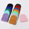 Gorro de punto transfronterizo más vendido para mujer, gorro cálido de invierno para ciclismo con protección para las orejas, gorro de punto a prueba de viento de lana para hombre, al por mayor en stock