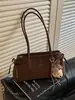 Bolso de Axila de Moda para Viajes Diarios para Mujer 2026 Modelo Nuevo Bolso de Hombro y Axila Simple Versátil Bolso de Mano de Nicho con Textura