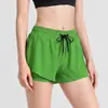 Shorts deportivos de secado rápido para mujer, pantalones de yoga transpirables con cordón anti-exposición, pantalones de fitness de tres cuartos de estilo falso dos piezas, estilo delgado de verano