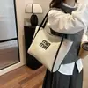 Versión Coreana Ins Letra Bolsa de Tote de Gran Capacidad 2025 Nueva Bolsa de Hombro Casual para Compras Moda Clase Bolso para Viajar