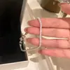 Pulsera de Perlas Coreana Popular de Nicho de Alta Gama para Mujer, Versátil y Exquisita Joyería de Mano con Lazo de Corazón de Zircón