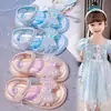 Sandalias de punta abierta para niña 2025 verano nuevo suela blanda zapatos de princesa dulce niña playa zapatos de bebé zapatos de cristal