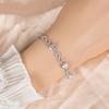 Pulsera vintage de circonita con forma de corazón esmeralda europea y americana en forma de S de tres capas chapada en platino temperamento femenino personalidad pulsera al por mayor