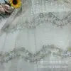 Tela de encaje sexy de primavera y otoño, falda de encaje bicolor calada, abrigo, material de tela de encaje