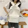 Nova mochila elegante e atraente de bolinhas para alunos do ensino fundamental II e médio, mochila casual leve de grande capacidade para meninas