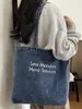 Bolsa de Mezclilla Casual de Gran Capacidad Shuai Mijia para Mujer 2026 Nuevo Bolso de Hombro para el Trabajo Ligero Bolso Tote para Estudiante Universitario