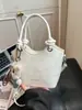 Bolsos de Moda Transfronterizos para Mujer 2026 Primavera Nueva Moda Bolso de Hombro Cruzado Bolso de Mano Estilo Coreano Casual Bolso Cubo