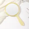Espejo de mano de doble cara gran aumento transparente mango de estudiante espejo de maquillaje portátil espejo de belleza portátil venta al por mayor de fábrica