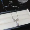 Ins Coreano Lujo Ligero Colgante de Mariposa de Circonita Cadena para Clavícula de Moda para Viajar Versátil Collar de Perla Gota de Agua Accesorios para Mujeres