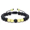 Pulsera de Piedra de Lava Negra con Cuentas de Metal Amarillo Cordón Elástico Ajustable para Hombres Pulsera de Cuentas de Roca de Lava para Protección y Fortaleza Joyería Espiritual Moderna y Elegante