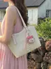 La popular bolsa tote versátil de color block de este año es un modelo nuevo para mujer de gran capacidad 2026, un bolso de hombro y axila moderno y a la moda.