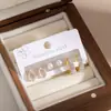Brincos de Pino em Aço Inoxidável Europeus e Americanos Transfronteiriços Mais Vendidos para Mulheres, Brincos Argola em Formato de Coração com Diamantes Completos Dourados, Conjunto de Três Peças de Brincos Individuais da Moda