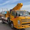 Vehículo de Trabajo Aéreo Autopropulsado de Carrocería Ancha 30.5 Jiangling Shunda Fabricado en Fábrica y Exportado con Plataforma Elevadora de Gran Altura