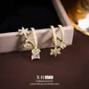 Pendientes Asimétricos de Zirconia Galaxia Bañados en Oro Real Pendientes Geométricos de Alta Gama de Nicho Francés Pendientes Elegantes Elegantes