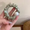 Anillo para el pelo de perla pequeña de intestino delgado simple de alta gama francés Cuerda para el pelo elegante retro Accesorios para el pelo de coleta baja Bola Tendón del Cuero Cabelludo