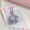 Ins Simple Dulce Fresco Auriculares Tridimensionales Llavero Colgante Creativo Viento Frío Bolso Colgante Joyería Regalo para Novia Venta al por Mayor
