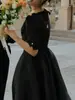 Vestido de noche negro de longitud media para mujer estilo Hepburn, adecuado para sesiones de fotos en estudio, reuniones de parejas y fiestas, ofreciendo un look elegante y sofisticado, adecuado como vestido de novia ligero