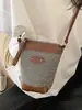 Bolso cubo tejido estilo coreano y japonés para mujer, nuevo modelo 2026, bolso de hombro/cruzado para teléfono casual y súper popular, bolso pequeño moderno y versátil