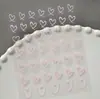 Pegatinas de Arte para Uñas Corazón Hueco Transfronterizas, Lote Mixto Multicolor, Versátiles Pegatinas Planas Láser de Corazón para Uñas DIY, Modelo Dh