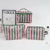 Bolsa de maquillaje impermeable de PVC transfronteriza, neceser a rayas de gran capacidad, bolsa de almacenamiento de cosméticos de viaje elegante y versátil