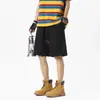 Shorts casuais azuis-marinho com corte enviesado estilo americano para homens, calças de seda gelada de secagem rápida para o verão com um toque jovem e corte solto