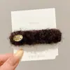 Pinza para el pelo de niña otoño invierno 2026 estilo nuevo pinza para flequillo pinza de pico de pato osito pinza recta retro pinza de fieltro de lana para el pelo tocado