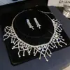 Aretes y collar de dos piezas con colgante de flor y gota de agua incrustados con diamantes, cadena para la clavícula de moda y exquisita, joyería de lujo ligero y de alta gama para mujer