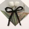 Estilo coreano simple asimétrico lazo de perlas DIY tejido a mano clip para el pelo de cuentas accesorios para el cabello pendientes material al por mayor