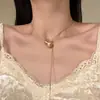 Collar de Calabaza Fulu Cepillado Tirable para Mujer El Más Fácil de Combinar Nuevo Estilo Chino Cadena Larga para Suéter Accesorios Nuevos Otoño e Invierno 2025