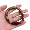 Nueva Serie de Pulseras de Cuentas Zhuasa de Tendencia Nacional con Cáscara de Coco Estilo de Lujo Ligero Nicho para Mujeres que Realza el Cutis