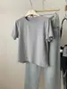 Top básico simple de otoño e invierno para mujer, cuello redondo, manga corta, con costuras visibles, corte holgado, diseño en el hombro derecho, efecto adelgazante, capa base versátil