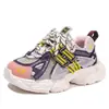 Zapatillas infantiles 2026 primavera y otoño zapatos tipo papá para niños zapatillas de correr de suela blanda de malla transpirable de moda zapatillas casuales para niñas