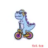 Comercio exterior dibujos animados dinosaurio lindo bordado tela pegatinas DIY niños camiseta material auxiliar con parche adhesivo pegatinas impresión personalizada