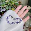 Elegantes Adornos de Mano de Flor de Ciruelo con Incrustaciones de Zirconia AAA Europea y Americana Chapado en Oro Blanco Joyería de Venta Caliente de Comercio Electrónico Transfronterizo Pulsera de Zirconia