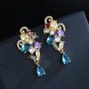 Aretes caleidoscopio de moda plata s925 temperamento tendencia callejera aretes espejo millón de flores chapados en oro amarillo 18K pin para la oreja