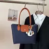 2026 Nueva Moda Popular Elegante Estilo Coreano Personalidad Ins Bolso Casual Bolso Tote de Hombro Axila Bolso Cruzado para Mujer