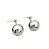 Nuevos Pendientes Redondos de Bola Estilo Metalero Europeo y Americano, Pendientes de Botón Minimalistas, Versátiles para Otoño e Invierno, Pendientes Vintage para Mujer al por Mayor