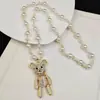 Collar de Perlas de Camelia que Gotea Aceite Nueva Moda para Mujer Exquisita Cadena Larga para Suéter Colgante Versátil de Ropa de Alta Gama