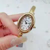 SUNLIFEX Comercio Exterior Pulsera para Mujer Reloj Moda Impermeable Cuarzo Reloj para Mujer Caracteres Romanos plateado Sentido de Lujo Antiguo