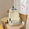 Mochila de gran capacidad estilo coreano de nicho para hombres y mujeres, adecuada para estudiantes de secundaria, preparatoria y primaria, mochila ligera casual nueva para viajes