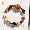 Prosperidad y Riqueza Bodhi Dieciocho Semillas Quemado al Carbón Cinco Bendiciones Pata de Gato Pulsera Artesanal Original Pulsera de Hilo para Mano Versátil Unisex