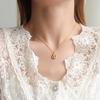 Collar con colgante en forma de gota de agua al por mayor, cadena para clavícula que no se decolora para mujer, nicho francés de lujo ligero que no se decolora, acero de titanio transfronterizo