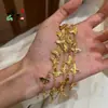 Pulsera de Mariposa Láser de Cinco Flores Alta Retención de Color Popular en Transmisión en Vivo Estilo Simple Moda Lujo Ligero Versátil Pulsera de Temperamento Venta al por Mayor