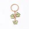 Chaveiro de borboleta acrílica com cores quentes de gota de óleo transfronteiriça com diamantes, ornamentos para bolsa, vendas diretas da fábrica Amazon