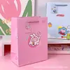 Serie O bolsa de regalo de cartulina blanca gruesa en relieve papel de embalaje para regalo de cumpleaños bolsa de papel al por mayor bolsa tote de dibujos animados para niños