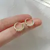 Pendientes de perla de alto brillo 2022 nuevos pendientes de moda pendientes de diseño de nicho para mujer pendientes pequeños pendientes otoño e invierno