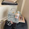 Bolso de nicho con relieve estilo extranjero para mujer, nuevo modelo 2026 mini mochila para viajes y salidas