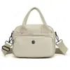 Nova Bolsa de Nylon Fashion Transfronteiriça Nova Versão Coreana Multicamadas com Zíper Tendência Versátil Bolsa de Mão Casual Feminina Atacado
