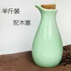 Grabado creativo logo petaca dividida taza pequeña de vino de cerámica media kilo petaca botella de vino vacía de porcelana para uso doméstico